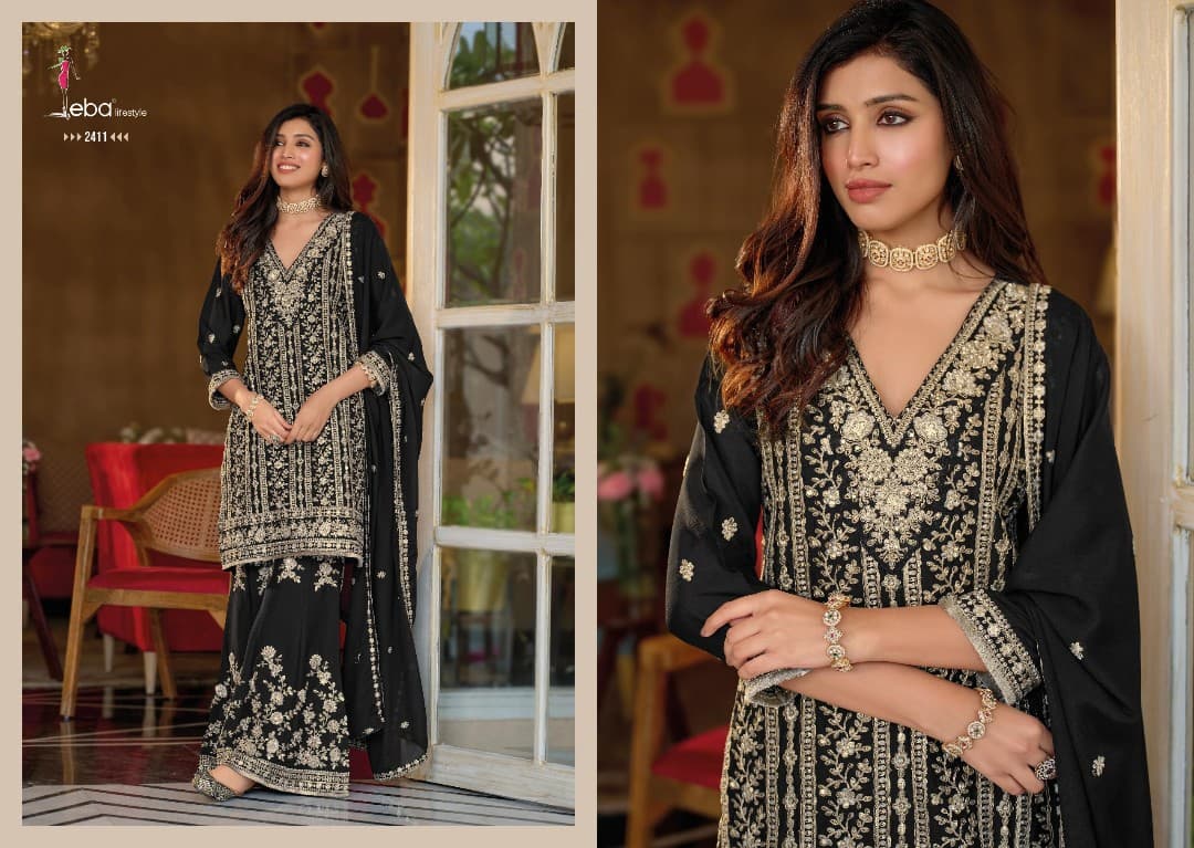 Zvezda Boutique – Black salwar suit with all-over gold embroidery, styled with a matching dupatta, shown full length and in detail